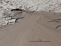 Photograph of a mud volcano on the Hite delta, Glen Canyon National Recreation Area. Mud volcano is about 0.5 m across. 