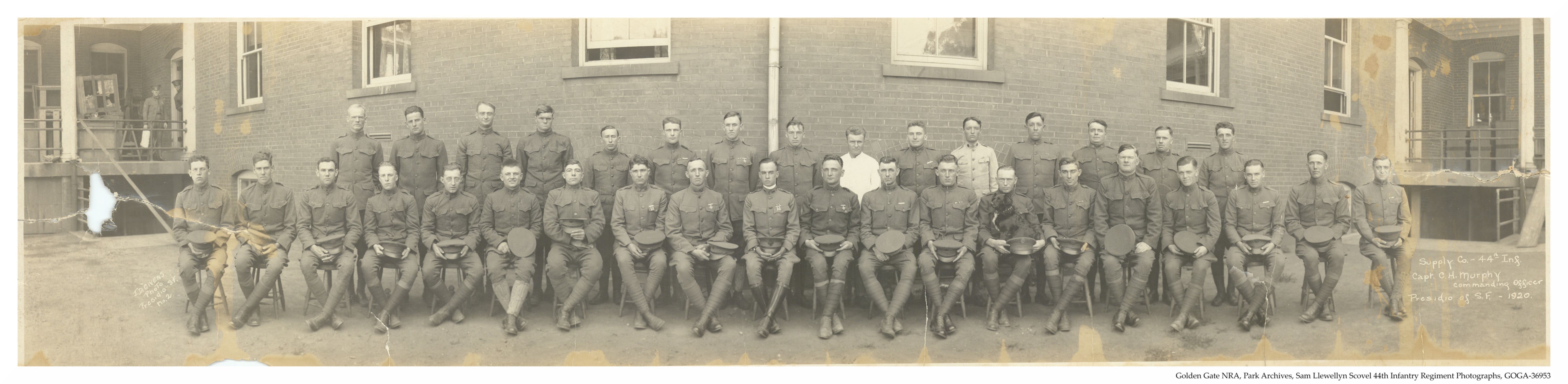 44th infantry supply company taken in the presidio of San Francisco in 1920 in front of brick barracks. 