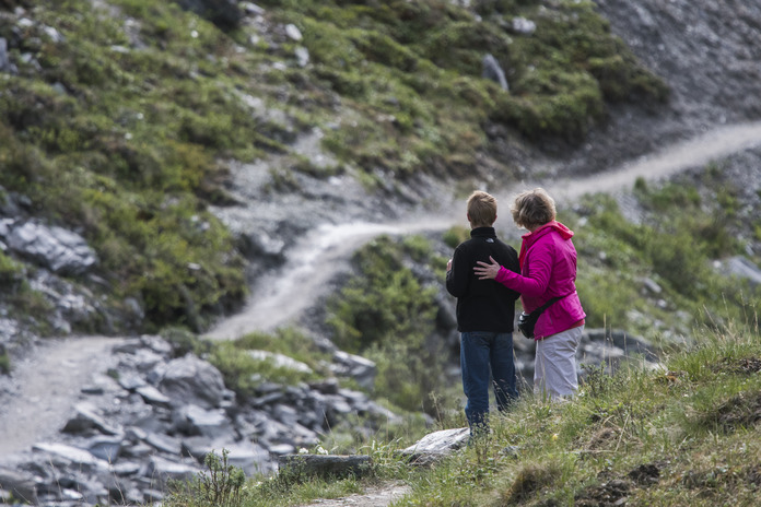 two people on a trail
