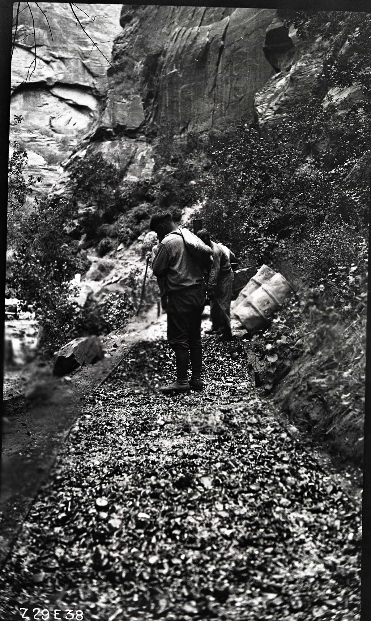 Narrows Trail construction- sprinkling on the locking course.
