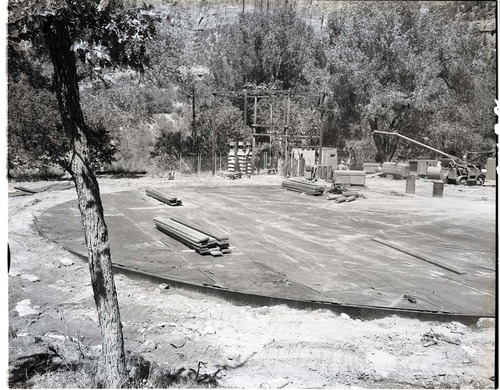 Construction of million gallon water tank at Birch Creek- laying steel plate for floor.