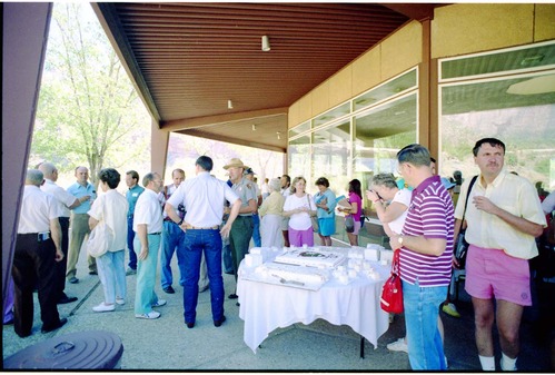 Color Photos of the parks 72nd anniversary celebrations- cake cutting, barbecue, speakers.