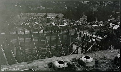 New superintendent's residence under construction with the pouring of concrete for basement walls and footers. Building 1.