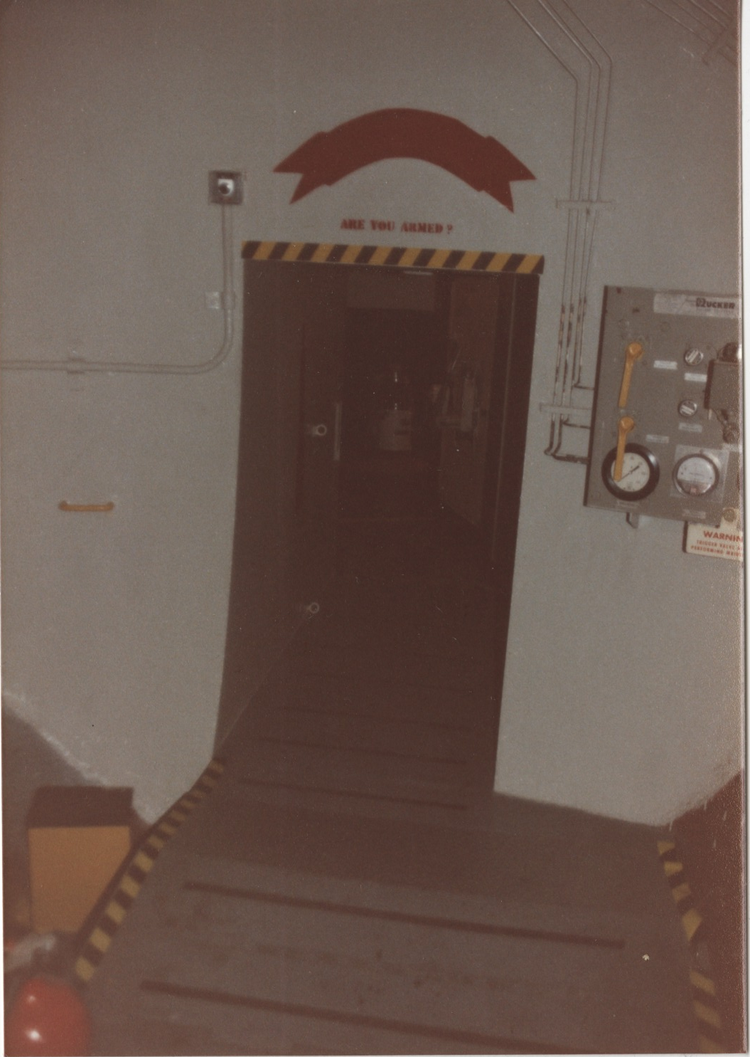 View from the doorway to the control center towards the passageway to the blast door.