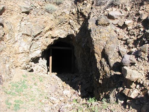 Open shafts and adits at Bighorn Mine, an abandoned gold mine in Feb 2007 and Jan 2009.