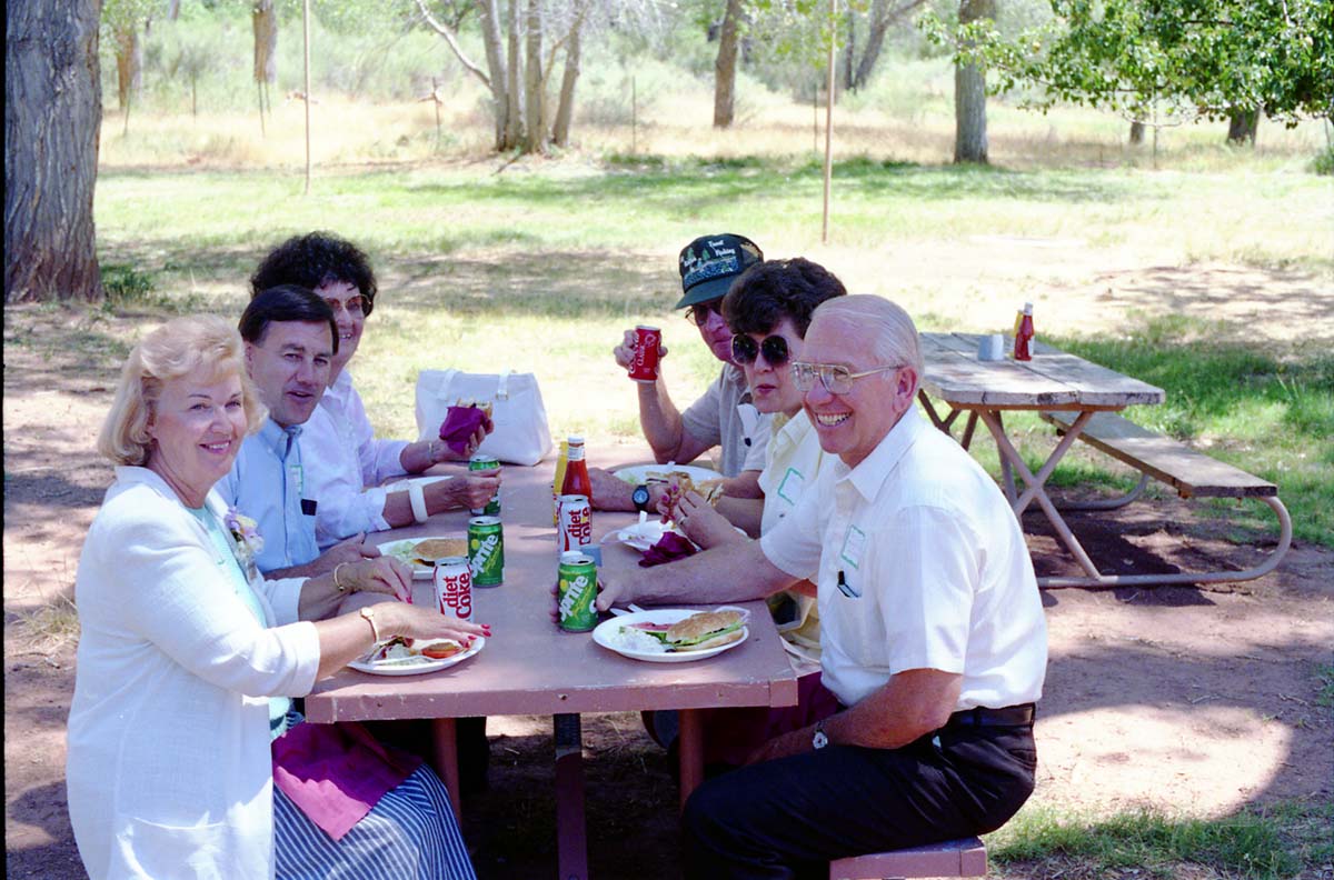 Color Photos of the parks 72nd anniversary celebrations- cake cutting, barbecue, speakers.