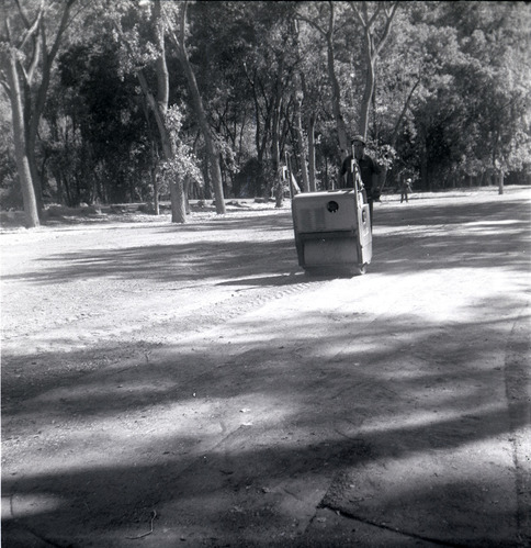 Man working on construction for the Grotto parking area.