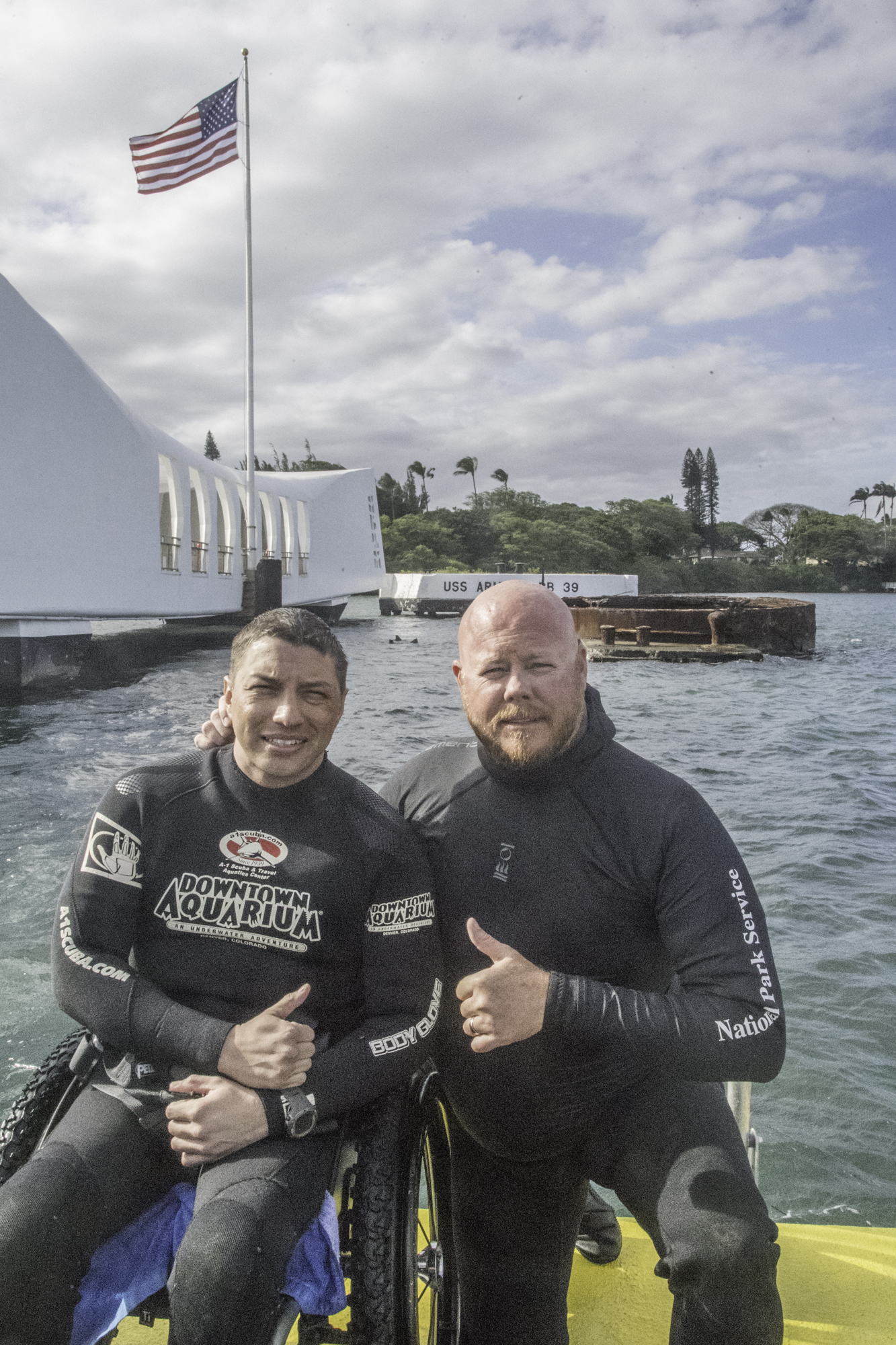 US Army veteran David Ortiz, a T-10 complete paraplegic from a helicopter crash in Afghanistan, dives with the National Park Service at the USS Arizona, Pearl Harbor, HI.