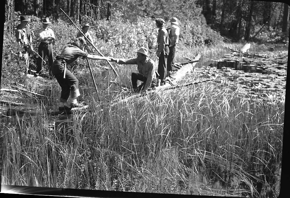 388-2 Men Working by river