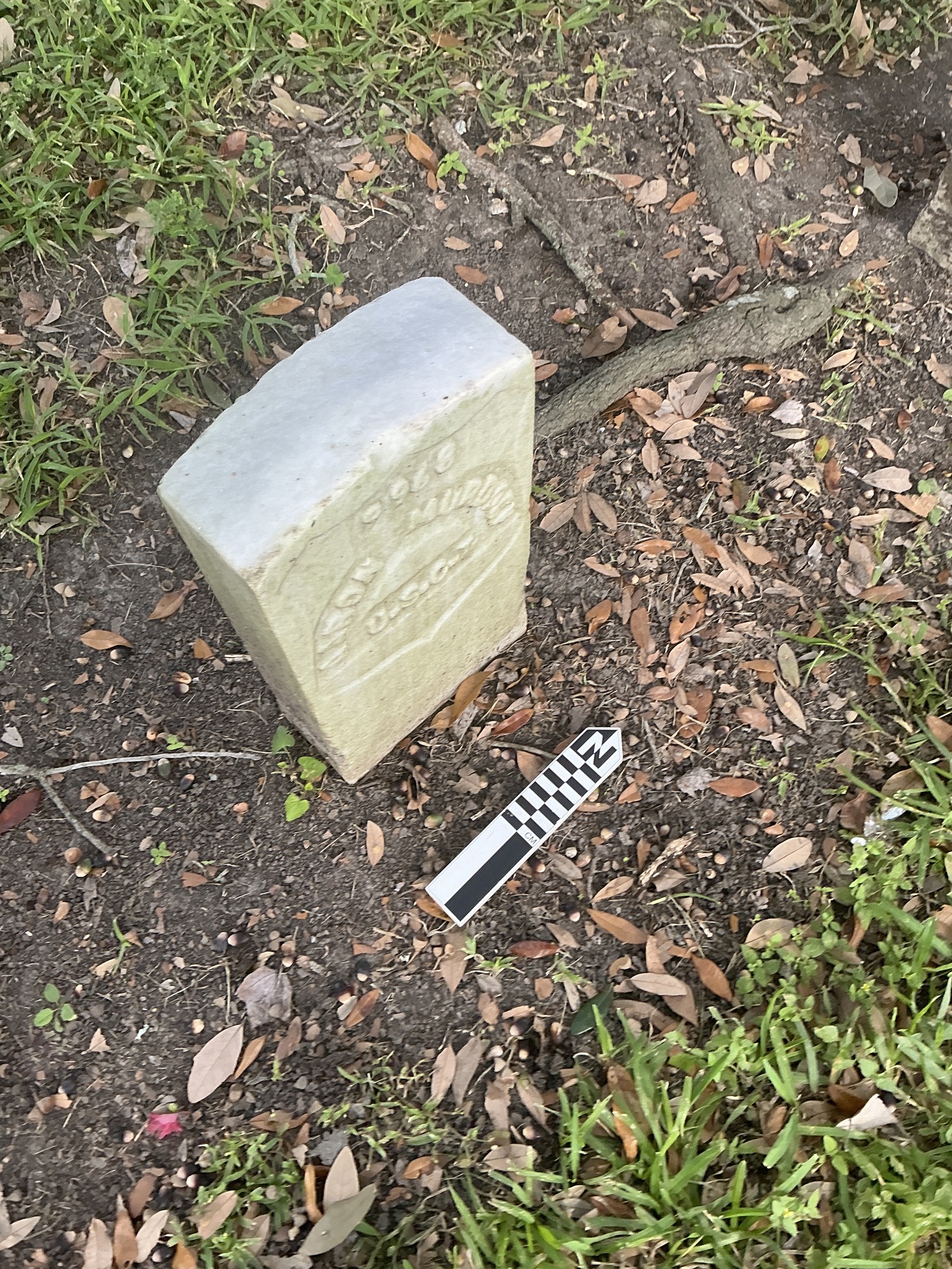 Extra image of historic upright marble headstone with recessed shield with recessed lettering face.