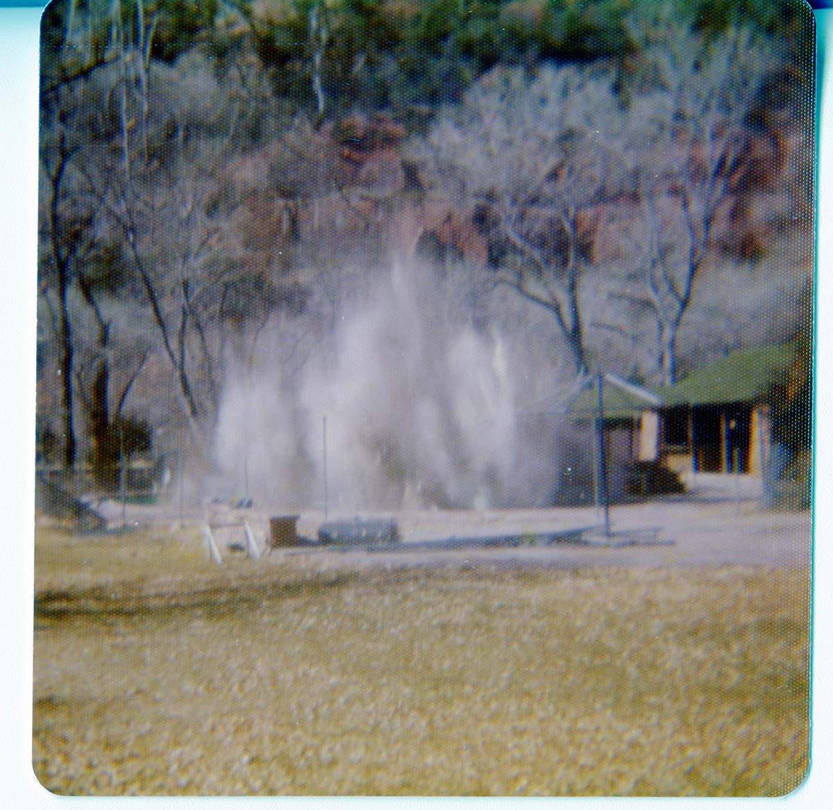 Dust cloud from the destruction of the lodge pool and bathhouse.