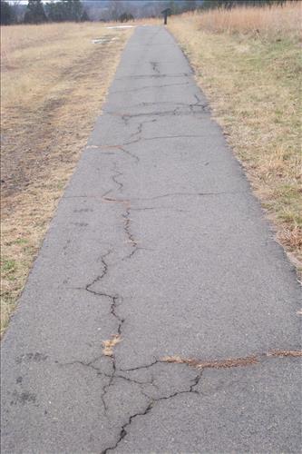 Documentation of resurface asphalt roads (New York Avenue, Chinn Ridge Road) and handicap accessible trail.