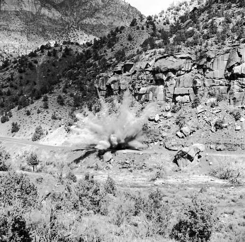 B&W negative of rock removal from Pine Creek road (Zion-Mt. Carmel Highway--State Route 9), blasting by road crew. [No positive. Fingerprints on the negative.]
