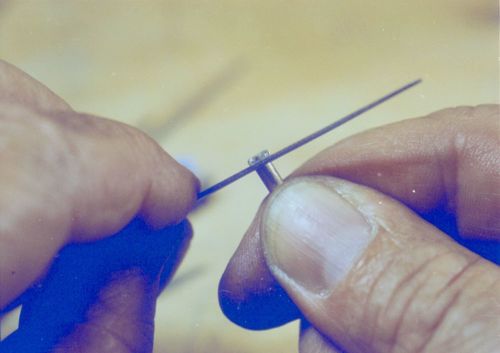 Making a mast band for the model of Kathleen (built 1901; spritsail barge), circa 1968-1969