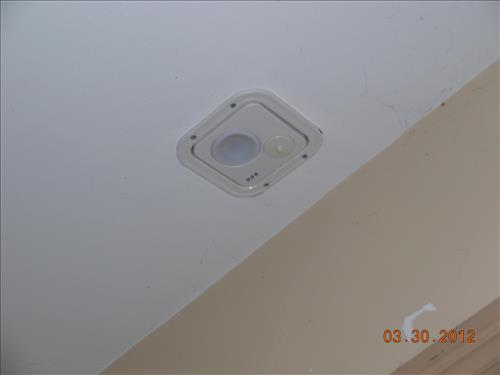 Photo images from March 30, 2012, of the new Life Safety fixtures (motion, smoke, and fire detectors) installed in Building 38 in Lower Town, Harpers Ferry, WV, as part of the PMIS 62917B project scope of work in 18 buildings.