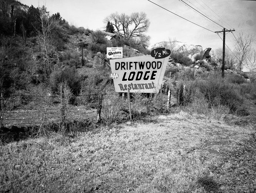 Roadside signs in Springdale. Driftwood Lodge and Restaurant 'Best Western Motel'