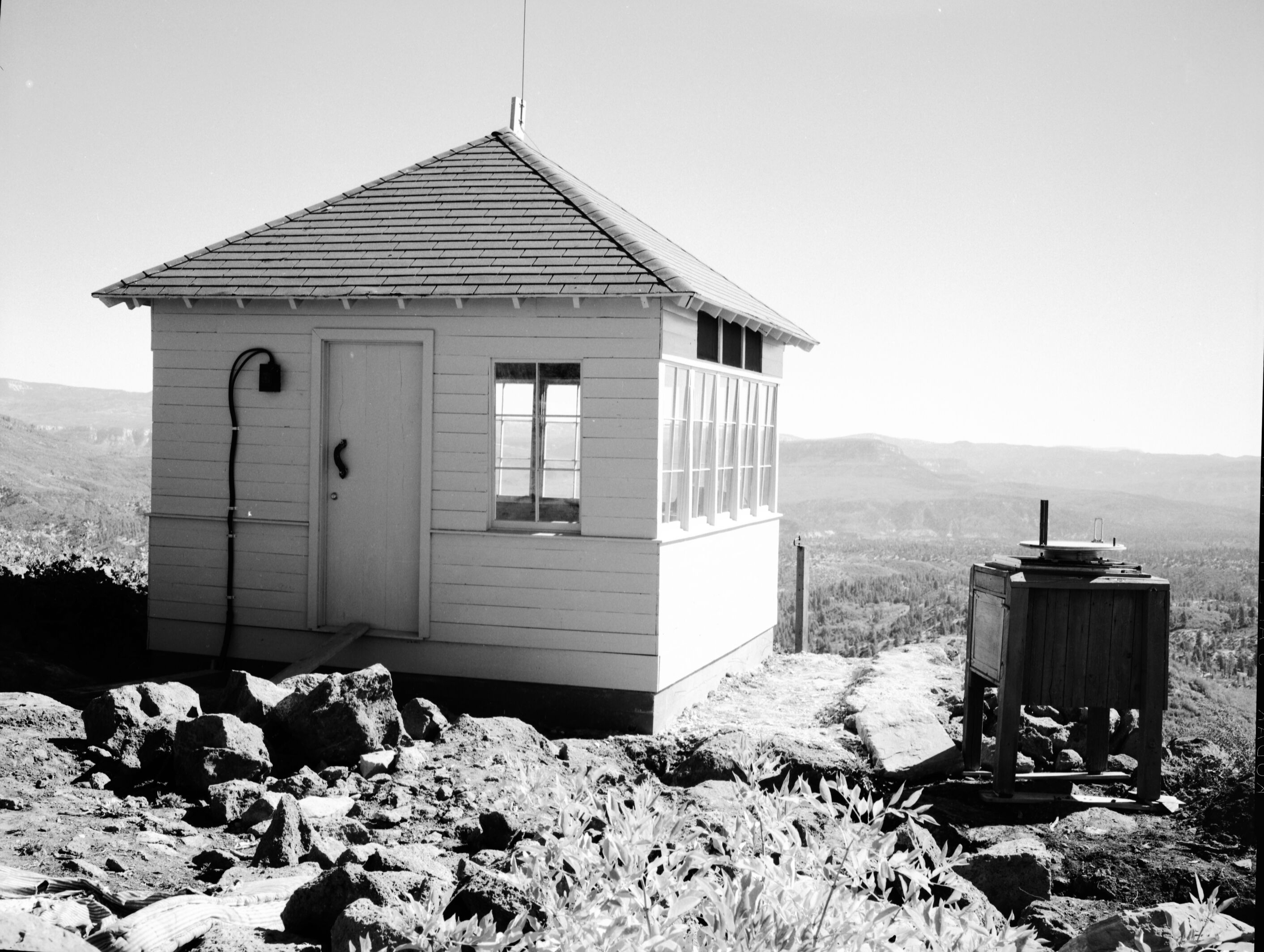 Fire lookout on Lava Point, Building 139 with view from point.