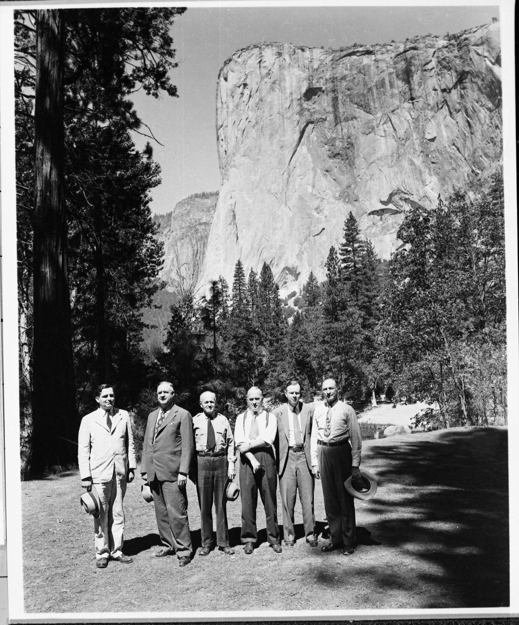 Copy Neg: J. Ernest, 1983. L-R: William E. Warne (Assist. Comm. Bureau of Rec.), Congressman Jed Johnson (Oklahoma), Supt. Kittredge of YNP, Congressman John J. Rooney (N.Y.), William A. Deval (clerk of the House Interior Appropriations Subcommittee), Major O.A. Tomlinson (Reg. Director of Region 4 NPS).