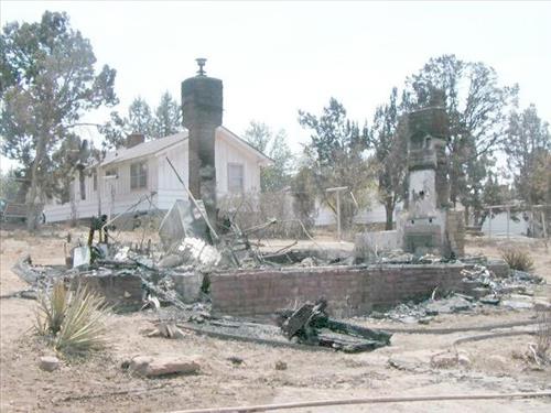 Burned houses following the Long Mesa fire, Mesa Verde National Park, August 2002