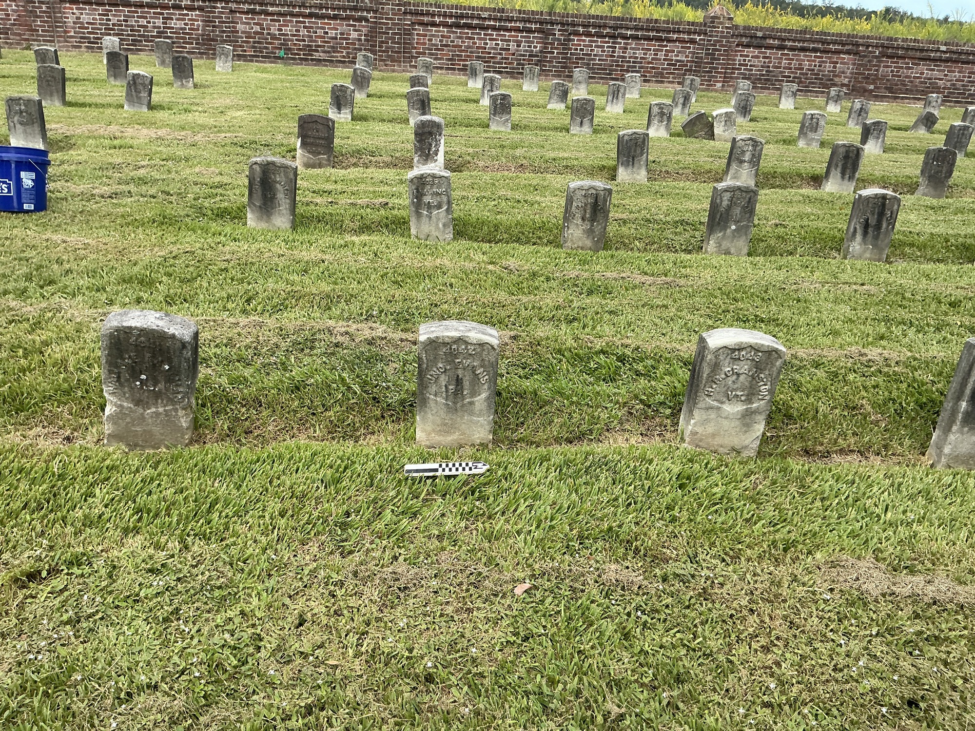 Extra image of historic upright marble headstone with recessed shield face.