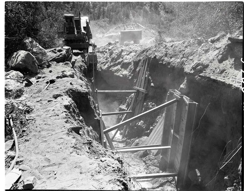 Water supply system - mouth of Birch Creek- excavating trench for water line.