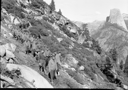 Hiking Soldiers of 30th Field Artillery from Camp Roberts headed by Col. Ray W. Barker on 11 mile trail.