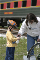Cuyahoga Valley Scenic Railroad, Bikers Waiting to Board Train. In 2007 CVSR and NPS launched Bike Aboard!service to encourage use of the railroad as alternative transportation. For a $2 fare cyclists can ride the train in one direction and bike the other along the Ohio & Erie Canal Towpath Trail. Some images are at Rockside Station and others in Peninsula near the Peninsula Depot.