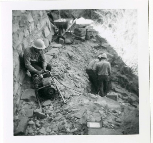 Workers repairing trail damage on the Hidden Canyon trail.
