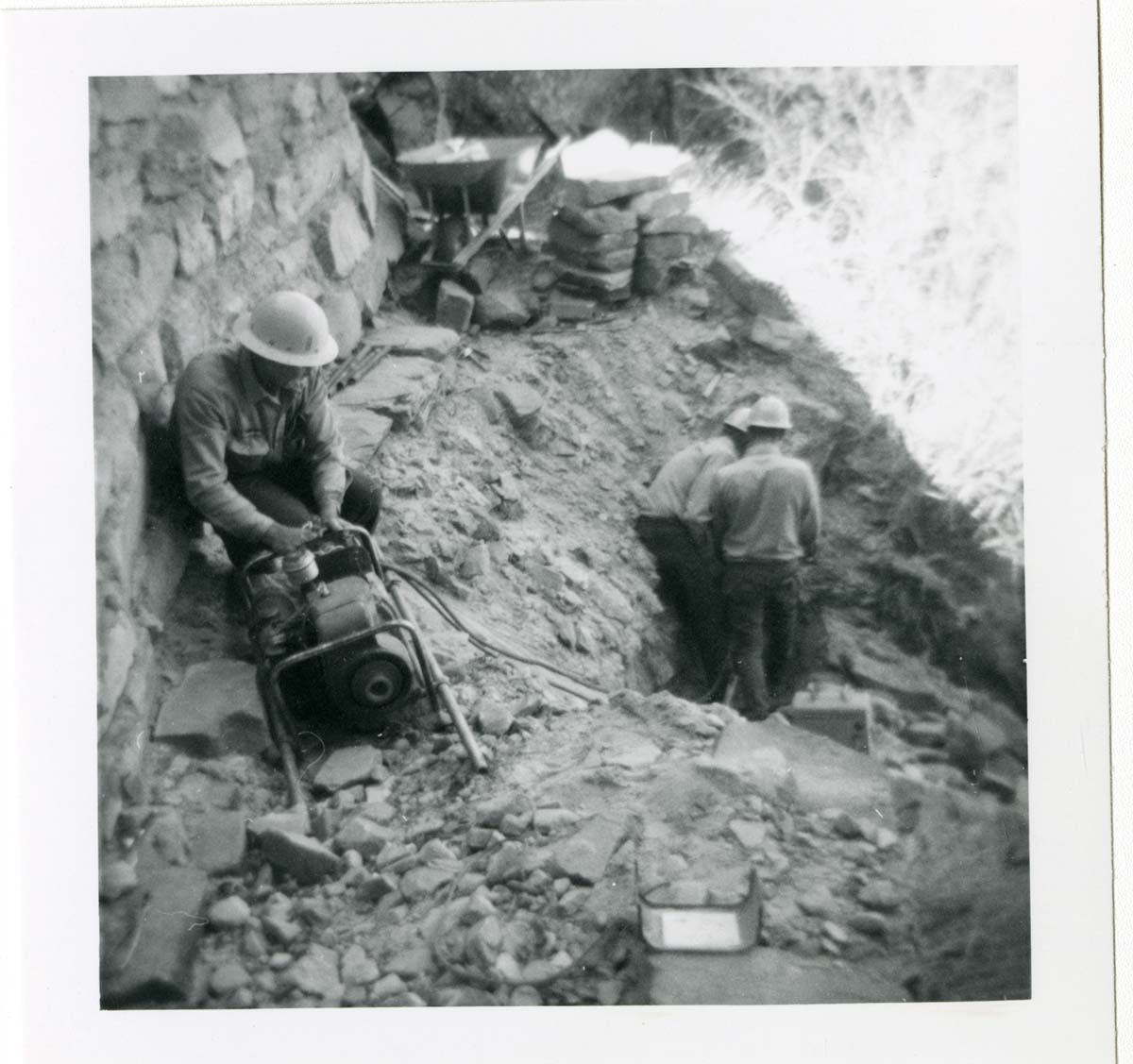 Workers repairing trail damage on the Hidden Canyon trail.