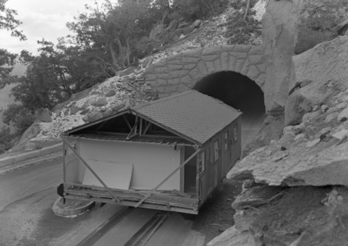 Building used at the Ahwahnee during the Navy occupation being transported to Crane Flat by way of Big Oak Flat Road and tunnel. See RL-19,834-19,838.
