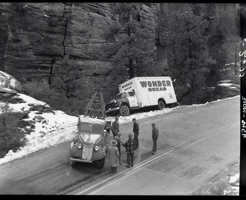 Wonder Bread truck off road east of small tunnel. Cause of accident icy road, too much speed