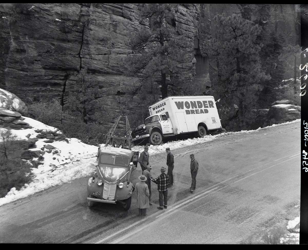 Wonder Bread truck off road east of small tunnel. Cause of accident icy road, too much speed