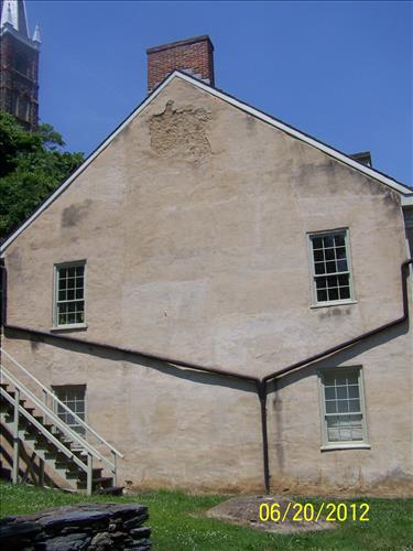 2012 - Views of the deteriorating stucco on the west elevation of the historic John Wilson Building #45 in Lower Town, Harpers Ferry, WV.