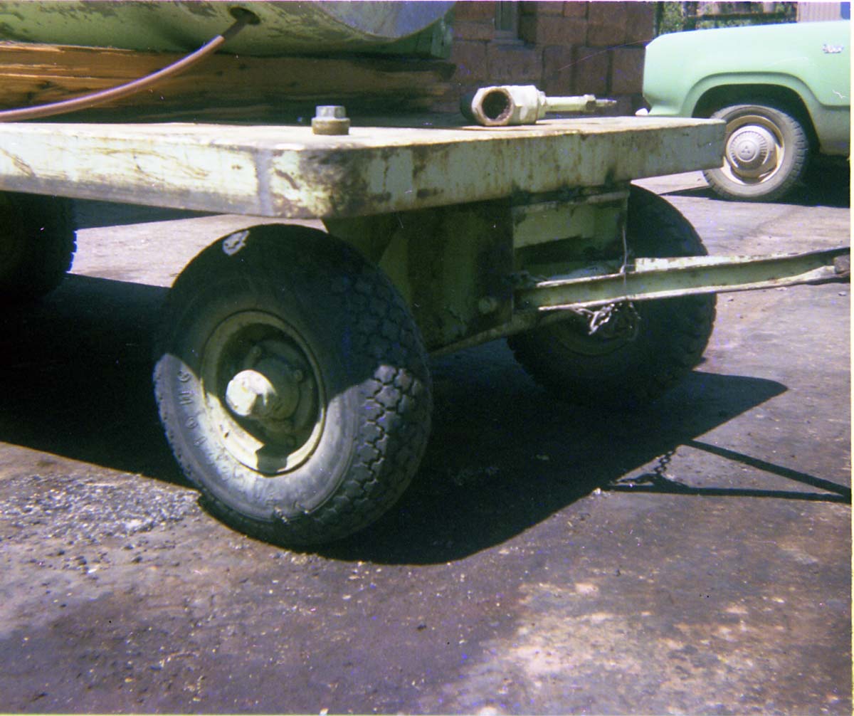 Color Photos of park trailers. Tank loaded onto trailer.