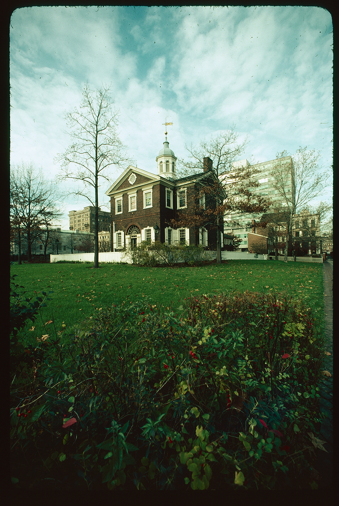 Carpenters Hall. Exterior. South and east sides. Looking north from bushes near west side of Hudson's Alley.