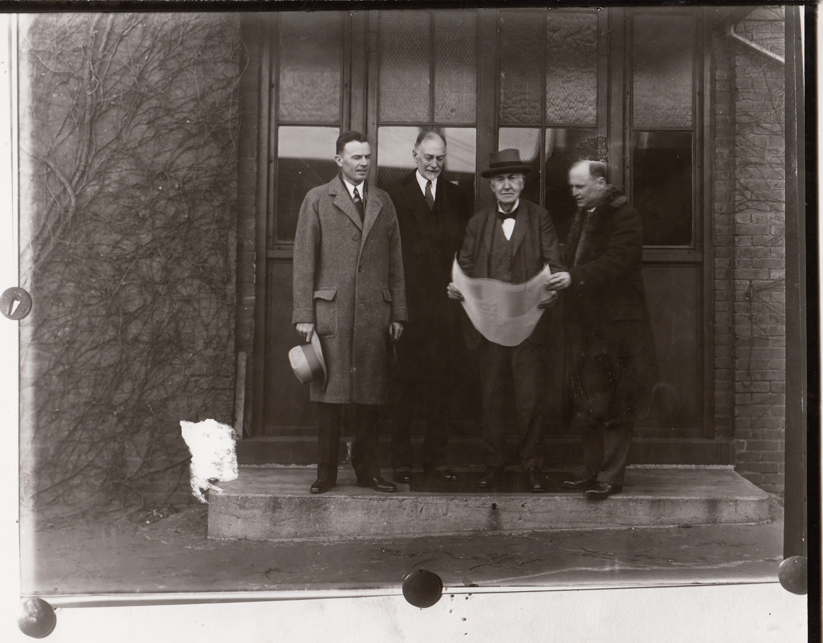 George E. Montgomery, Nelson C. Durand, Thomas Edison, and unidentified man in front of Building 5.