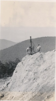 Drilling top of cut slope for flattening