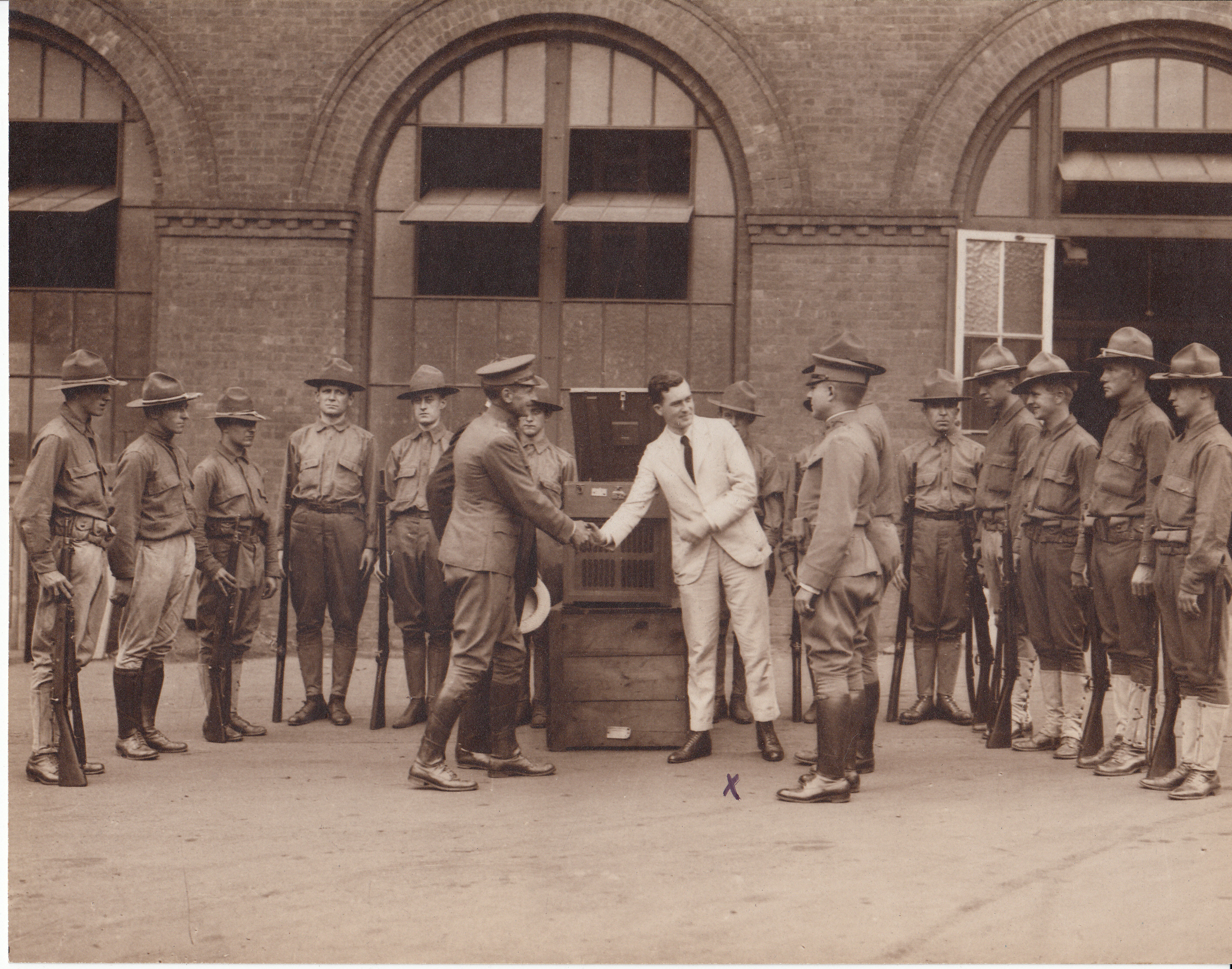 Charles Edison and soldiers with Phonograph (Army and Navy model) during World War I.