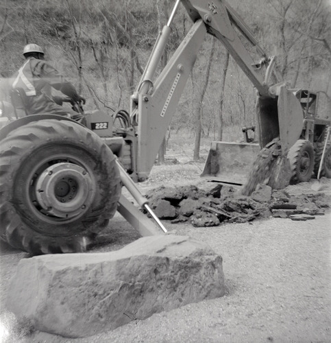 Man working excavator during road construction near the Temple of Sinawava.