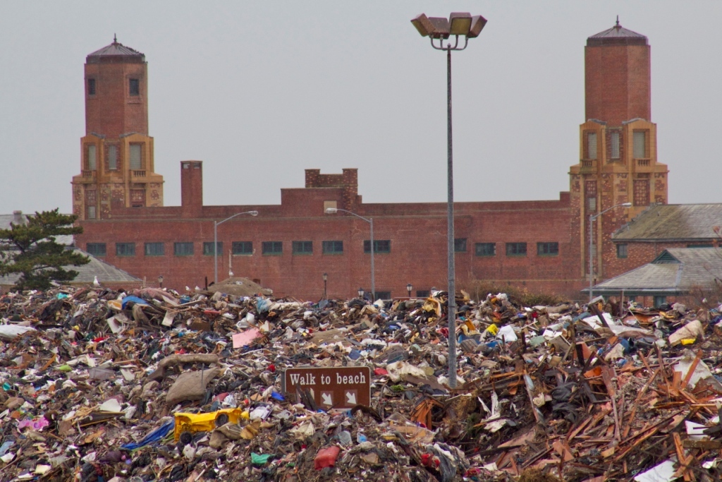 Garbage piled in front of historic Art Deco building