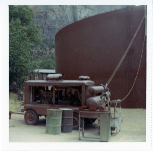 Repainting the exterior of the million gallon water tank at Birch Creek.