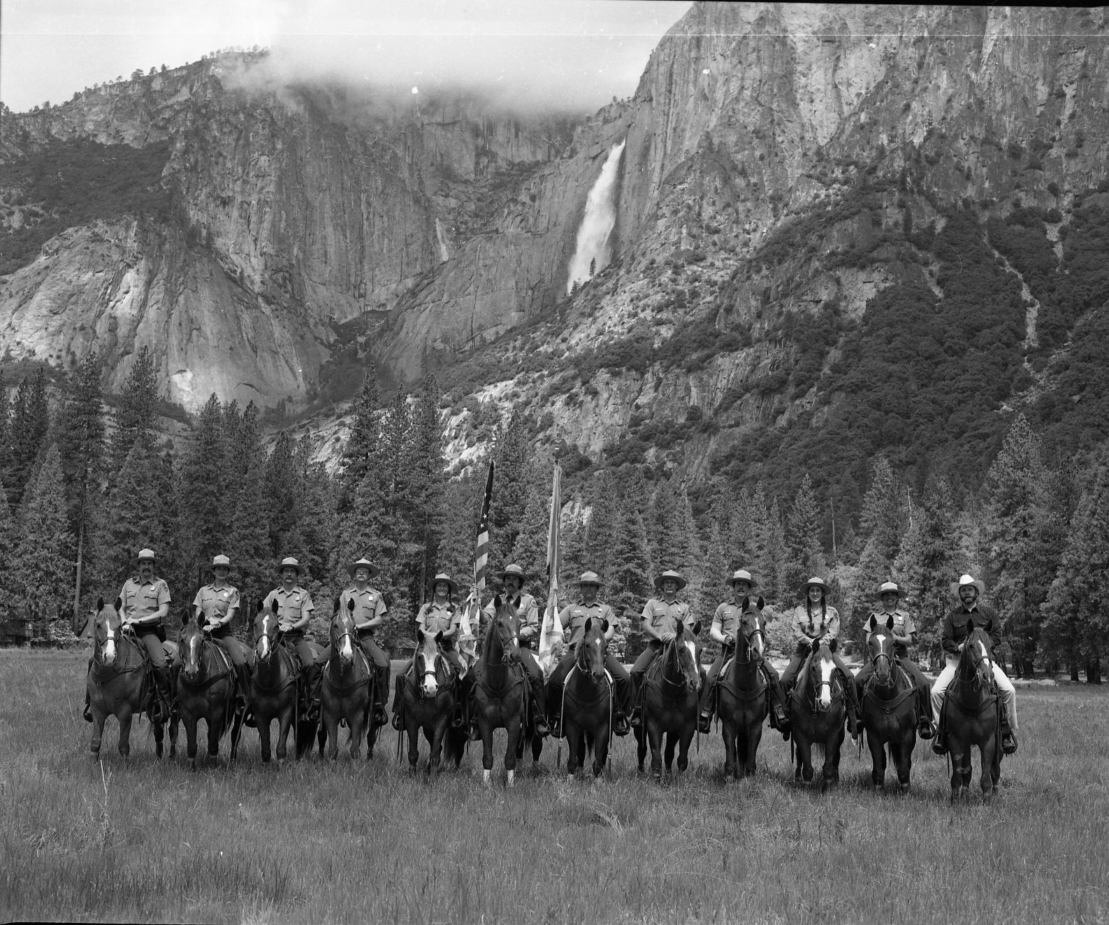 Graduating class from Horse Training, 1985. L to R: Dan Horner (Head of Horse Patrol), YNP; Jan Borromeo, G.G.N.R.A.; Charles Fullam, YNP; Travis White, Saguaro N.P.; Marilyn Muse, YNP; Charles Edgmon, Calif. State Parks; Jim Tucker, YNP; Trace DeSandres, YNP; Paul Ducasse, YNP; Suerie Levin, Sequoia/Kings NP; Pat Haddad, YNP-Maintenance; Larry Farrington, Calif. State Fish & Game.