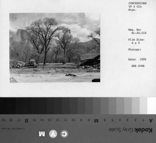 Yosemite National Park Company constructed carpenter, plumber, and electrical shops near Yosemite Creek in 1920-1923. They were razed in 1959 and a new warehouse was built in a different location. On the negative envelope: "Destruction of Old Maintenance Area."