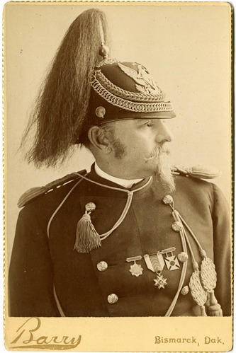 Long Bust View of Charles Illsley Wearing Helmet