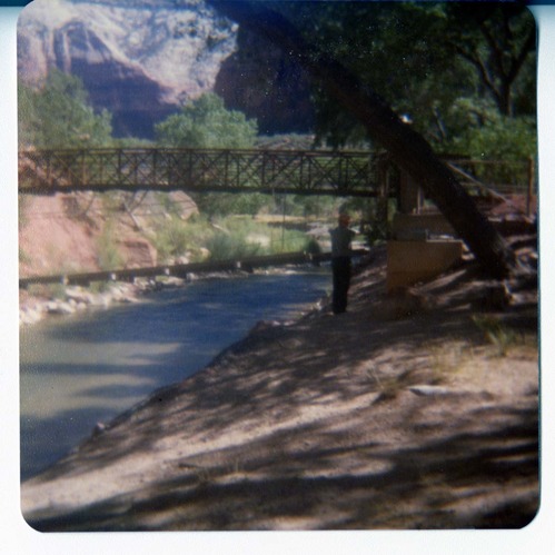 Man working on the emplacement of the Zion Lodge footbridge.