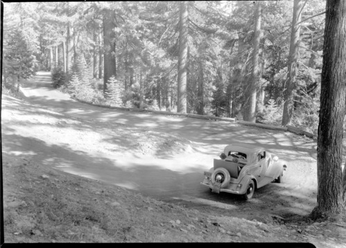 Car on turn above Wawona Tree on way to Wawona Point. Ralph H. Anderson (PWA)