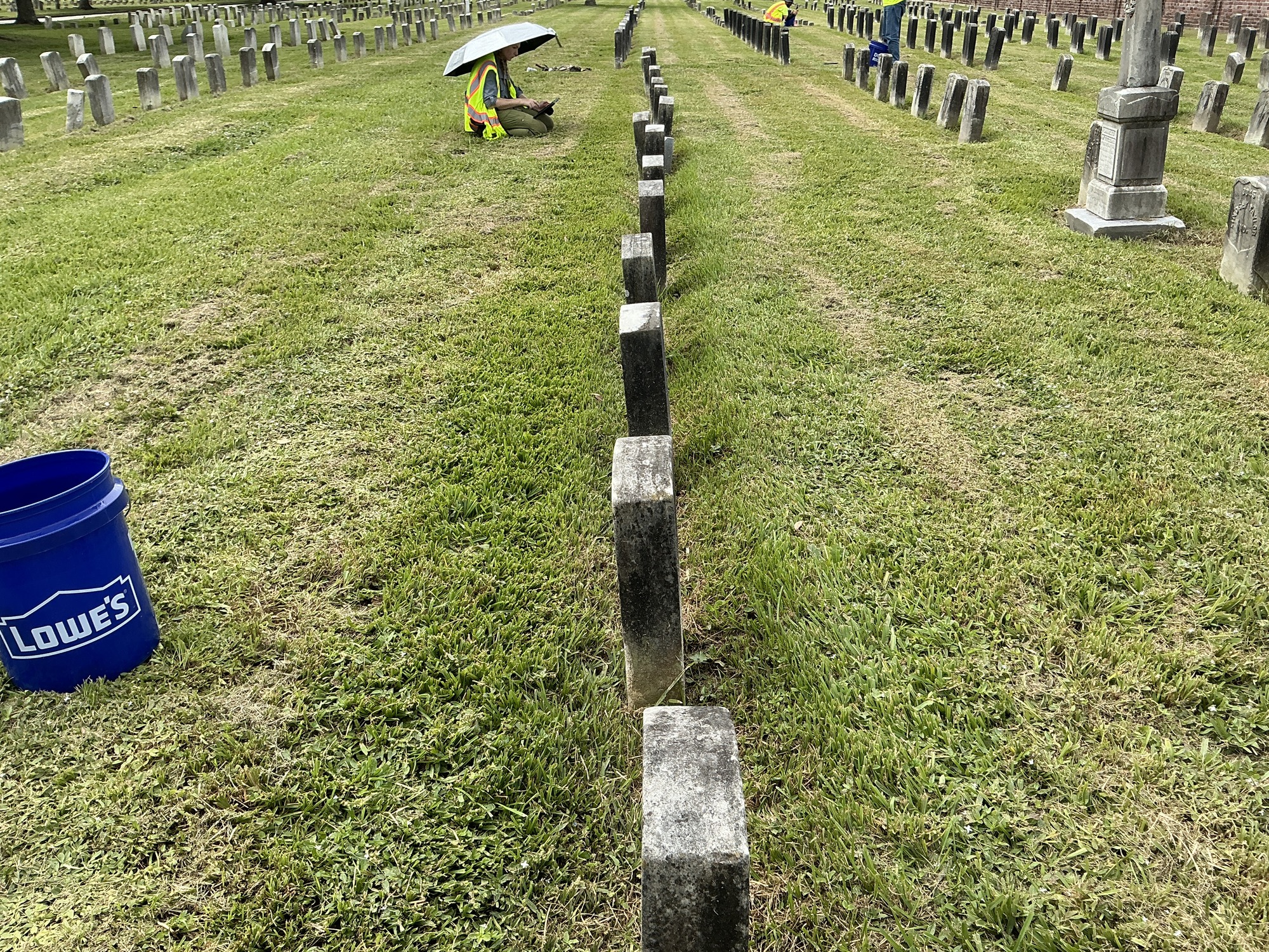 Extra image of historic upright marble headstone with recessed shield face.