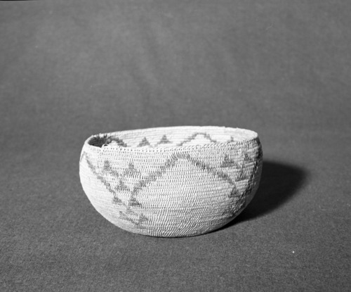Marie Rozier Collection, Catalog No. 62. Object: Miwok basket. Dimensions: 9 x 4". Materials: brakcen fern root, bull pine. Technology: split single rod; fag ends trimmed on work face; moving ends trimmed on interior or concealed by successive stitches; slanted rim finish. Collection History: Alice Reade Collection. Photographed by Michael Dixon Dec. 1982. Catalogued by Craig Bates and Barbara Beroza. Yosemite Collections, National Park Service.