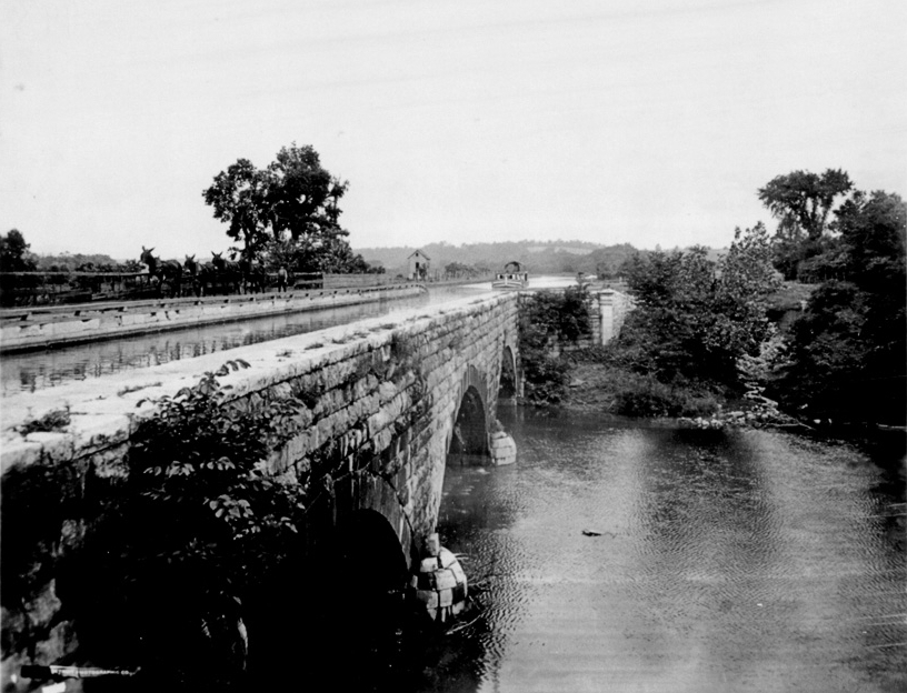 Historic Photograph of canal boat flowing through the Conococheauge Aqueduct