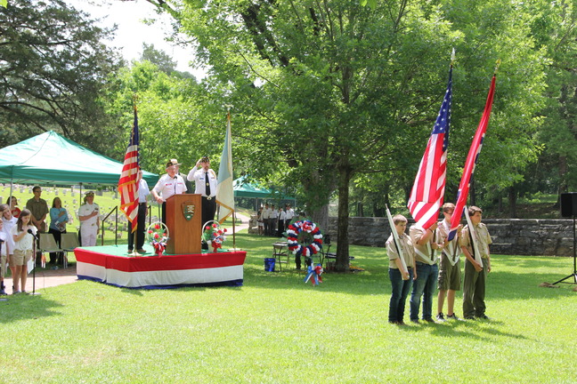 Boy Scouts present the colors during the Mameorial Day ceremony in the Shiloh National Cemetery